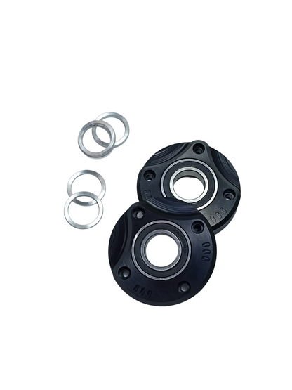 Front elastomer covers with bearings